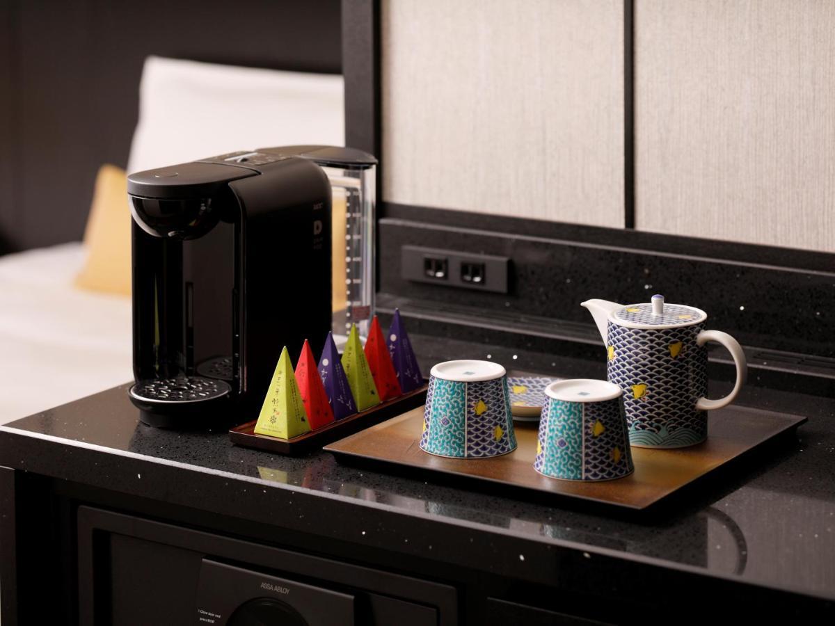 The Hotel Sanraku Kanazawa 21Th December 2022 Open Exterior foto A Nespresso coffee machine in a hotel room